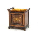 An Edwardian Florentine style music stool, with inlaid fall front and ring turned handles to