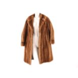 A three quarter length Palomino mink coat, by Higgs Furs, size approximately 12