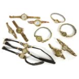 Twelve assorted wristwatches, to include a ladies 18ct gold mechanical watch with later 9ct