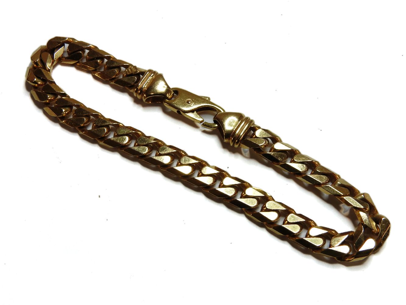 A 9ct gold filed link curb bracelet, 29.50g