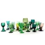 A collection of coloured glass wine glasses