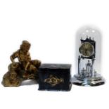 A Victorian paper maché tea caddy, a gilt clock section, mounted with a figure, and an anniversary