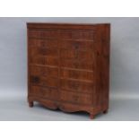 A 1920s mahogany double flight of fourteen drawers