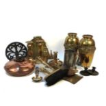 A collection of brass and copper wares
