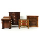 Four miniature furniture items, two chests, 20.5 x 20cm, a Davenport, 14cm, and a painted commode,