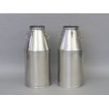 Two stainless steel churns