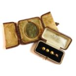 Three 18ct gold dress studs, a 9ct gold dress stud, and a gold frame oval picture locket, marked