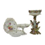 A pair of Dresden shell dishes, and a stand, with girl and lamb, 35cm tall