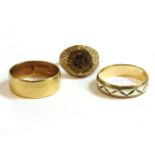 An 18ct gold wedding ring, a 9ct gold 1865 Mexican coin ring, and a 9ct two colour gold wedding