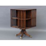 A mahogany revolving bookcase, 61cm x 61cm x 96cm