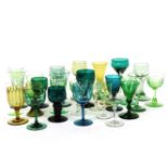 Whitefriars glassware including; wine glasses, green, clear and amber, and a large collection of
