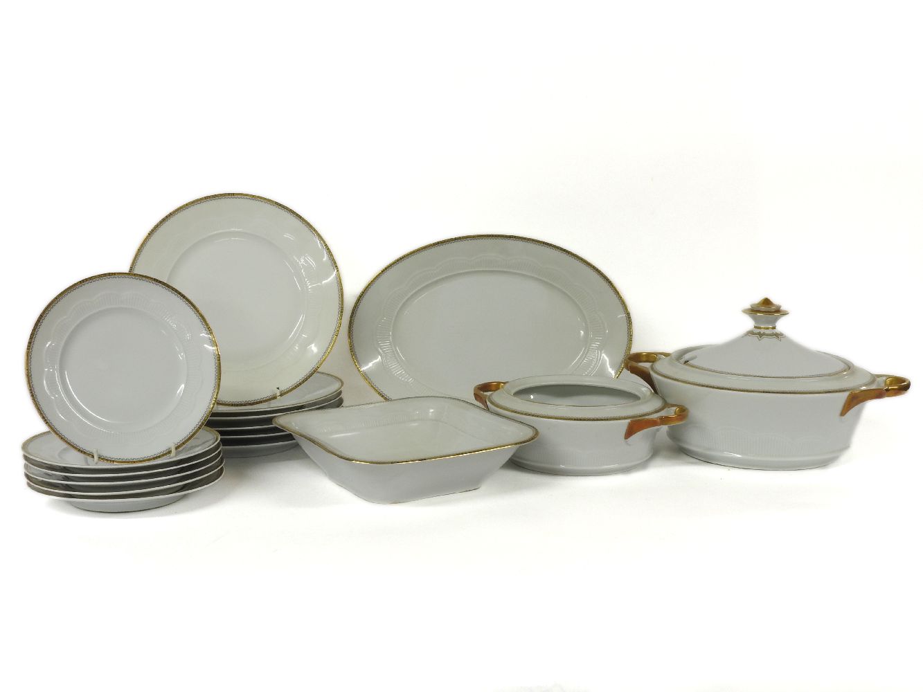 A mid 20th century Berlin porcelain part dinner service for six settings, to include platter,