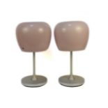 A pair of contemporary table lamps, with pink domed shades, each 47cm tall