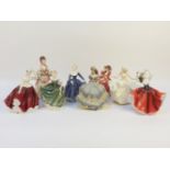 A Royal Doulton, figure 'Top O The Hill', HN1834, and a collection of six other similar