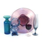 A collection of amethyst blue grass glasses, bowls, decanters, baskets and spiral twist items