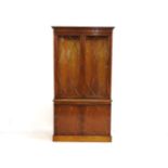 A George III style yew wood display cupboard, the astragal glazed upper section with cupboards