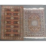 A Persian design rug, 190cm x 138cm, and another rug, 220cm x 138cm