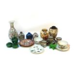A collection of Oriental porcelain and related items, including three scent bottles and a small