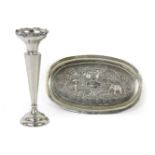 An Indian silver tray and an Edward VII silver vase,the vase, Chester, 1913the tray chased with an