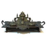 A late 19th century cast brass inkstand