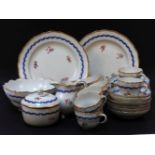 A Meissen tea set, comprising twelve cups and saucers, milk, sugar bowl and cover, and slops bowl,