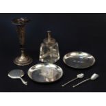 Silver items: two modern circular dishes, dolls mirror, two cruet spoons, small eastern specimen