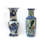 Two Chinese vases: one blue and white, 46cm high, the other with landscape and figure scenes, 45cm