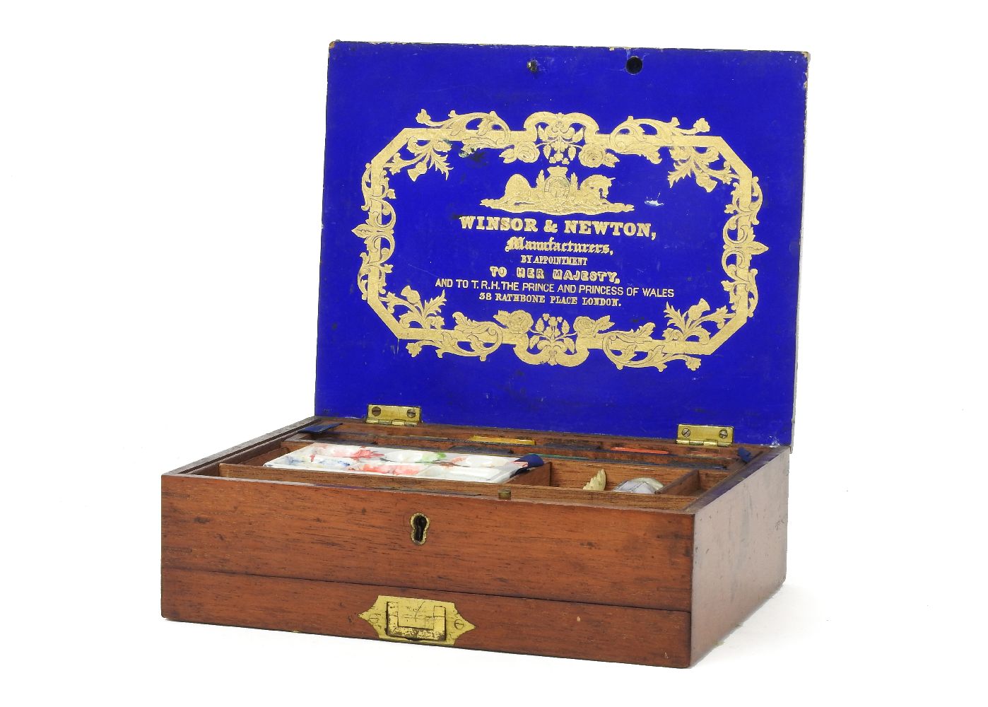 A Winsor and Newton artists box, with brass recessed handle to the drawer below, fitted with palette