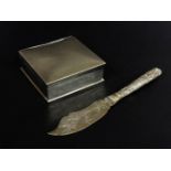 A silver cigarette box, with a dome top, plain body, 9cm wide, and a Chinese silver butter knife,