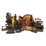 Nine various cast flat irons, together with a copper jug, copper plates, Victorian Spelter