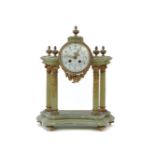 An Empire style agate mantel clock