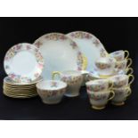A Shelley tea set, pattern no 2325, 'Rose Trellis', twelve plates, twelve saucers, eight cups, two