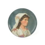 A Howell and James pottery charger, painted with a portrait of a girl, printed mark, 41.5cm