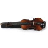 A late 19th century violin, and bows, and case