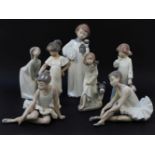 An Lladro figure of a young girl, and a collection of six Nao figures