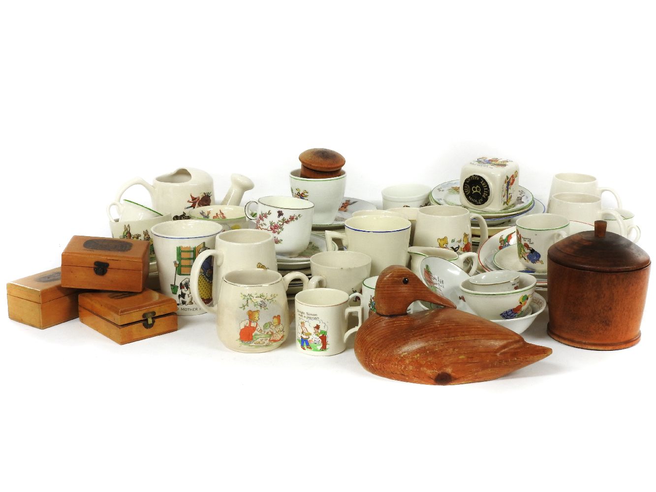 A collection of child's nursery tea wares, cups, saucers, mugs, and various Mauchline ware