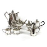A collection of silver plate, including Wenham Lake Co. silver plate Lymane patent ice jug, three