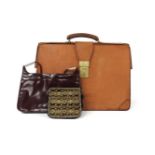 A Swaine Adeney leather briefcase, and two ladies handbags