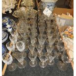 A quantity of Victorian and later champagne flutes, together with further drinking glasses, a