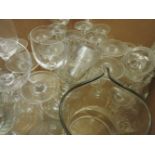 A collection of glassware, to include six decanters, some with silver labels, drinking glasses,