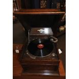 An oak table top gramophone, by Columbia