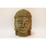 A carved stone head of moustached gentleman 29cm tall