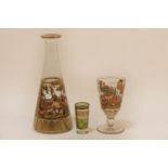 A bohemian enamelled glass decanter and goblet, decorated with a hunting scene, together with