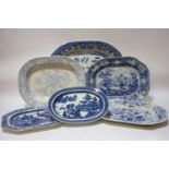 Six Victorian blue and white meat plates, various orientalist patterns, largest 59cm long