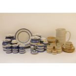 A collection of T. G. Green Cornish ware to include various jars and covers, some blue banded