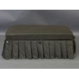 A modern striped upholstered ottoman, 125cm wide, and an upholstered ottoman, 110cm wide