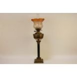 A Corinthian column oil lamp, converted to electricity with brass reservoir, 81cm (to top of