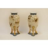A pair of early 20th century Continental porcelain vases, the ivory ground with gilt dragon fly