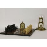 Two modern clocks, and a resin chess set