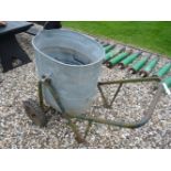 A mid 20th century galvanised and iron framed water trundler